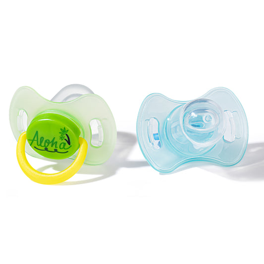 Makana silicone pacifier for newborn 2-pack with symmetrical design in green and blue.
