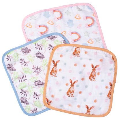 An organic bamboo baby washcloths 6 pack showcasing three cute prints including rainbows, leaves, and rabbits, designed as soft newborn face towels for sensitive skin.
