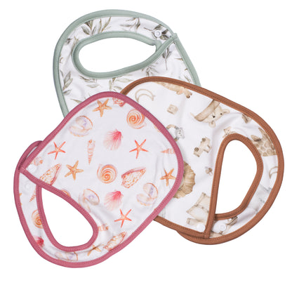 Makana organic bamboo cotton baby bibs 6 pack flat laid on a surface, showing the hypoallergenic organic bibs for sensitive skin quality.