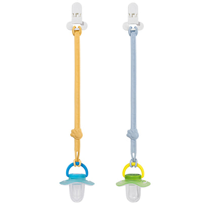 Two soft silicone pacifier clips securely holding a blue and a green pacifier to demonstrate the loop attachment mechanism.